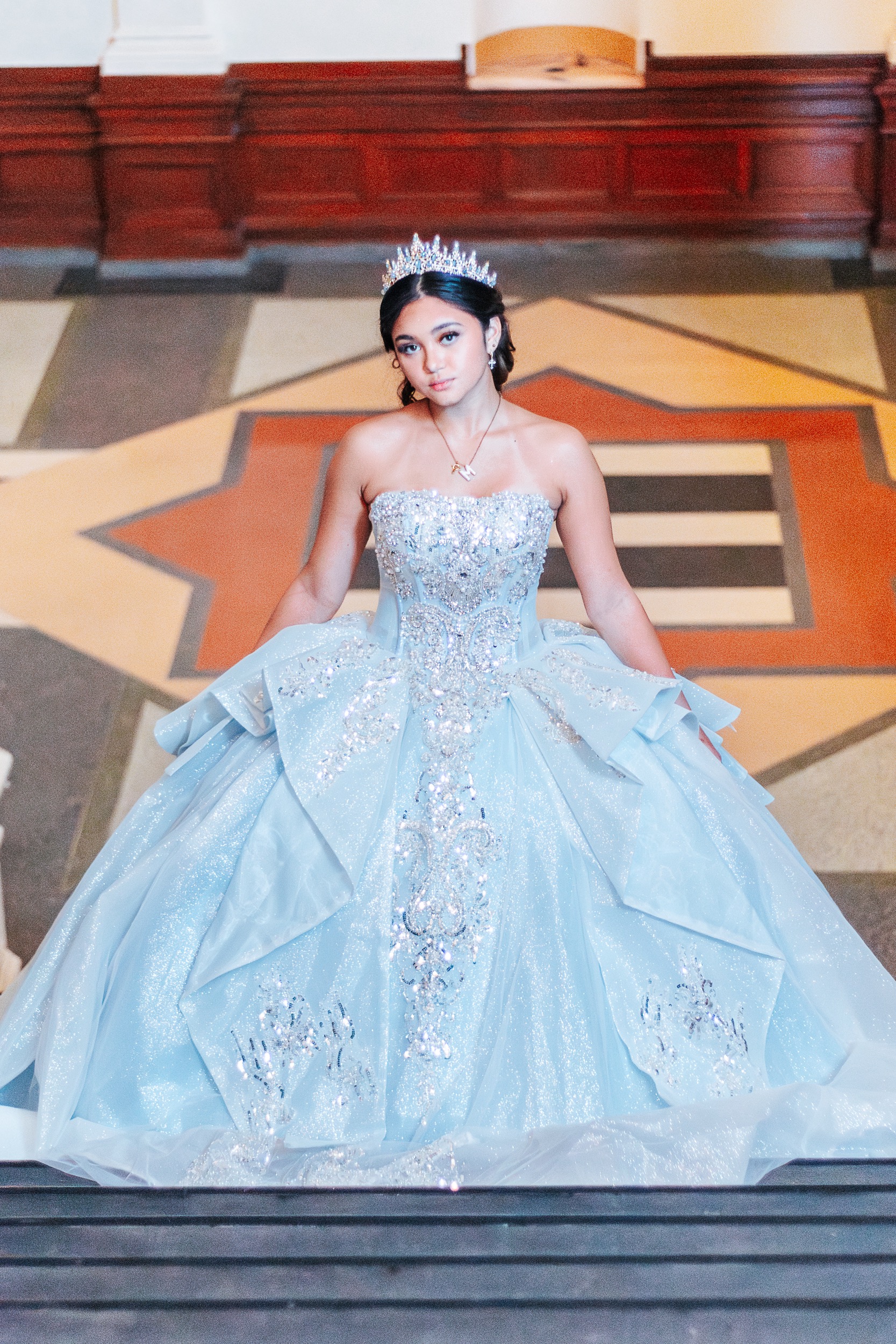 Quinceañera honoree in blue glitter ball gown at the Texas Capitol — Austin quinceañera photographer